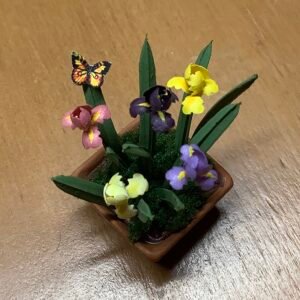 Making a pot of Irises by Dixie Cowles