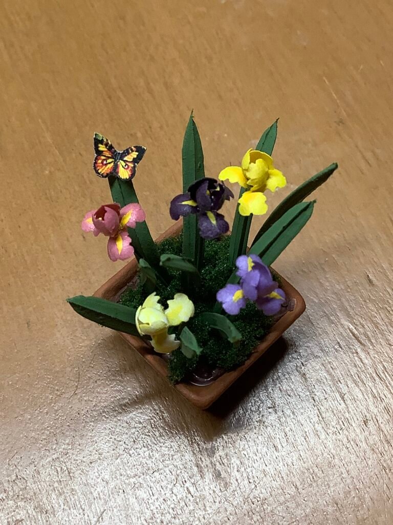 Making a pot of Irises by Dixie Cowles